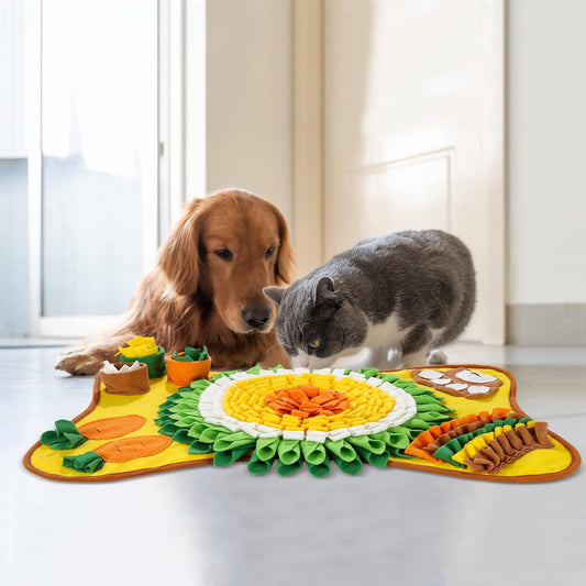 Golden retriever and grey cat sharing the yellow and green Snuffle Mat