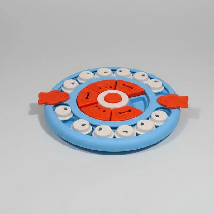 Blue and red Pizza Puzzle treat toy with slice covers and sliders