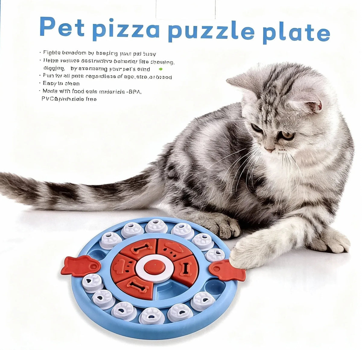 Tabby cat pawing at the blue Pizza Puzzle treat toy