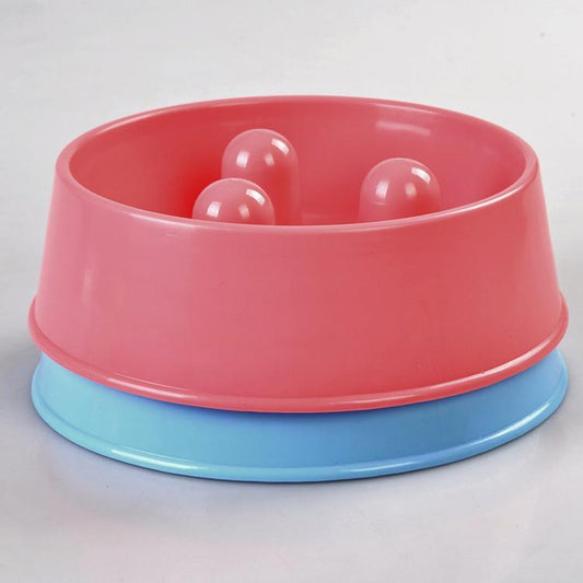 Pink and blue Slow Feeder Dog Bowls stacked, with raised pegs inside